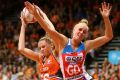 Super start: Jo Harten of the Giants and Maddy Turner of the Swifts contest possession.