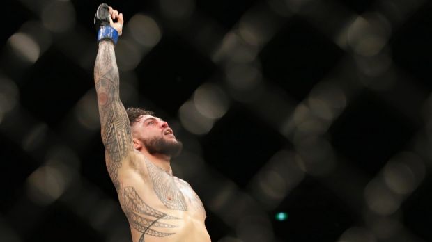 Rising star: Tyson Pedro celebrates his win in Melbourne at UFC Fight Night.