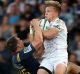 Aerial contest: Ben Smith and Damian McKenzie compete for the high ball.