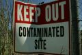 A generic 'Keep Out - contaminated site' sign.