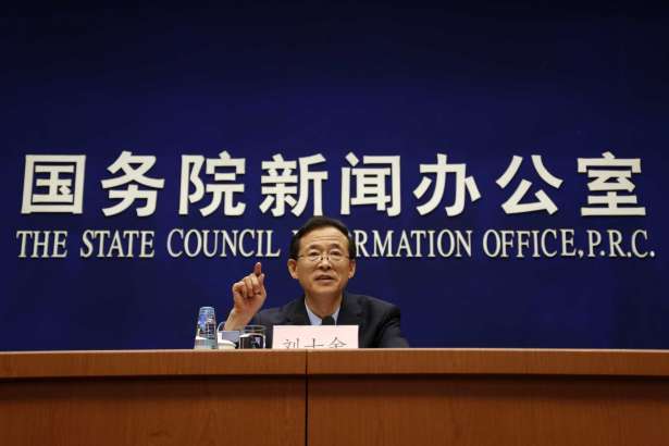 China Securities Regulatory Commission Chairman Liu Shiyu gestures as he speaks during a press briefing on the reform, stability and development of the Chinese capital market, at the State Council Information Office in Beijing, Sunday, Feb. 26, 2017.