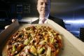 UBS believes Domino's could more than double its share of the takeaway food market in nine years, but short-term ...