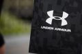 A shopper carries an Under Armour Inc. bag in Chicago, Illinois, U.S., on Saturday, July 23, 2016. Under Armour is ...