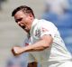 Steve O'Keefe celebrates the dismissal of Virat Kohli on day three.