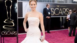 Jennifer Lawrence in clotted cream Dior at the 2013 Oscars...before she fell up the stairs.