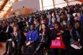 Participants at the climate conference listen to the speakers.