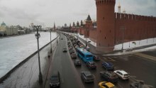 A line of sprawling traffic next to Russia's iconic buildings