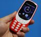 An attendee holds the new Nokia 3310 mobile phone, during a product launch event.