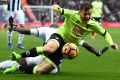 Bournemouth's Ryan Fraser is fouled by Allan Nyom of West Bromwich Albion.
