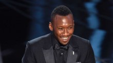 Mahershala Ali accepts the award for best supporting actor.