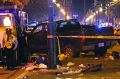 Police guard a pick-up truck that slammed into the crowd watching a Mardi Gras parade in New Orleans.