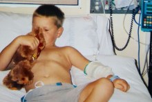 4 year old Denim Bucknell in a Brisbane hospital sick with Q fever and surrounded by medical equipment