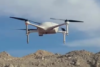 Airobotics autonomous, industrial  drone flies over mine site