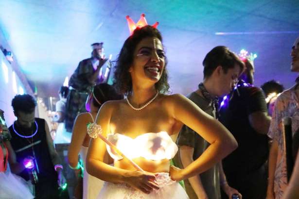 Revelers celebrate at the 'LED is My Light' street party in the early morning hours at the beginning of Carnival on February 24, 2017 in Rio de Janeiro, Brazil. Carnival officially begins today and revelers took over an underpass in the city to dance. Up to 70 cities and towns in Brazil are believed to have canceled festivities for Carnival this year amidst a severe recession in the country.