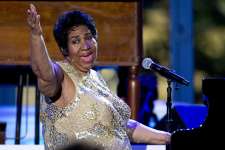 FILE - In this April 29, 2016 file photo, Aretha Franklin performs at the International Jazz Day Concert on the South Lawn of the White House of the Washington. Officials in charge of fixing up Franklin's childhood home in Memphis, Tenn., say they are working with the DIY Network to move the crumbling structure to a safer location and make it more attractive for visitors.  A judge had ordered it demolished, but he put that order on hold after preservationists stabilized the house.