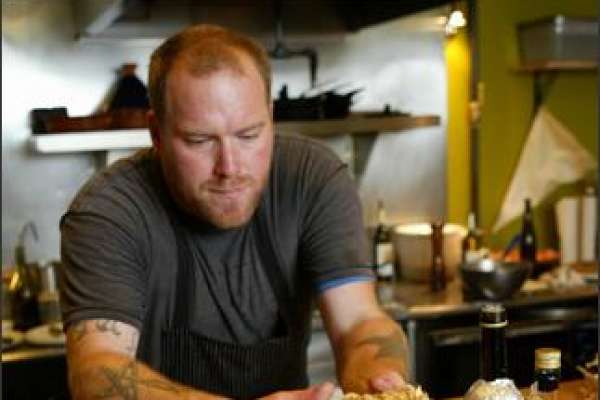 Matt Dillon, owner of Sitka & Spruce, prepares to cook Faber's cauliflower mushroom. Dillon has been named one of the country's top new chefs.