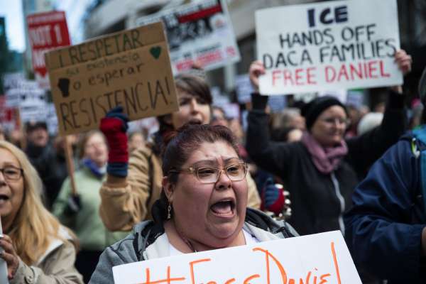 Protesters chant while marching in opposition of the arrest of DACA recipient Daniel Ramirez Medina, outside Seattle federal courthouse on Friday, Feb. 17, 2017.