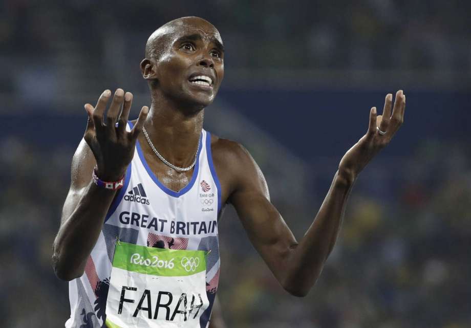 FILE- In this Saturday, Aug. 20, 2016 file photo, Britain's Mo Farah celebrates winning the gold medal in the men's 5000-meter final during the athletics competitions of the 2016 Summer Olympics at the Olympic stadium in Rio de Janeiro, Brazil. Quadruple Olympic champion Mo Farah maintained Sunday, Feb. 26, 2017, that he has always competed cleanly and never broken anti-doping rules, countering any association with "allegations of drug misuse." Photo: David J. Phillip, AP / Copyright 2016 The Associated Press. All rights reserved. This material may not be published, broadcast, rewritten or redistribu