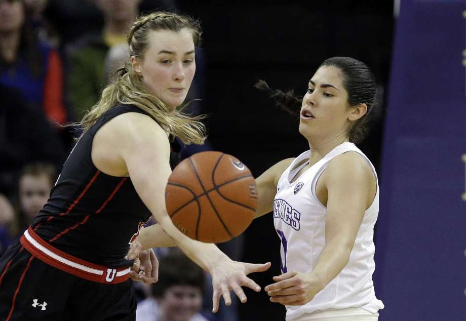 Washington's Kelsey Plum, right, passes the ball in front of Utah's Paige Crozon in the first half of an NCAA college basketball game Saturday, Feb. 25, 2017, in Seattle. Photo: Elaine Thompson, AP / Copyright 2017 The Associated Press. All rights reserved.