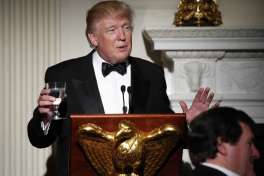 President Donald Trump makes a toast during a dinner reception for the annual National Governors Association winter meeting Sunday, Feb. 26, 2017, at the State Dining Room of the White House, in Washington.