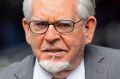 Rolf Harris faces a new trial on three charges of indecent assault, after a jury last week failed to reach a verdict.