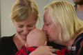 Sally Faulker is reunited with her baby, Eli, and her mother, Karen.