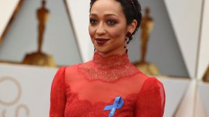 Ruth Negga wears an ACLU ribbon as she arrives at the Oscars.