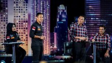  Candidate Agus Harimurti Yudhoyono (L) and Basuki Tjahaja Purnama (R) during the live televised debate.