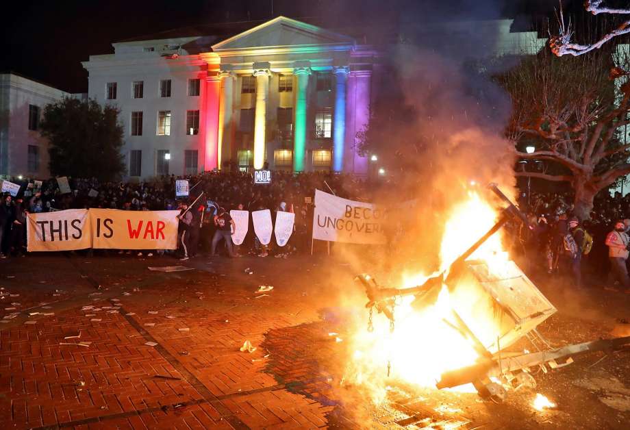 A portable light unit burns after protesters forced the cancellation of a talk by right-wing provocateur Milo Yiannopoulos at UC Berkeley in Berkeley, Calif., on Wednesday, February 1, 2017. Photo: Scott Strazzante, The Chronicle