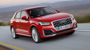 Dynamic photo, 
Colour: Tango Red 2016 Audi Q2.