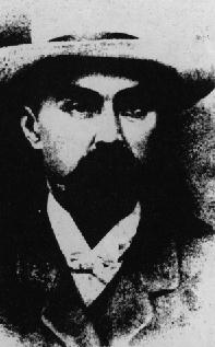 Plekhanov looking like Wild Bill Hickhock in broad cowboy hat