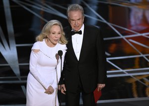 Faye Dunaway, left, and Warren Beatty present the award for best picture at the Oscars on Sunday, Feb. 26, 2017, at the Dolby Theatre in Los Angeles.