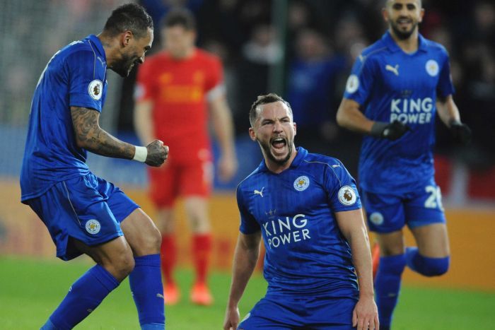 Leicester's Dannyl Drinkwater (C) celebrates after scoring against Liverpool on February 27, 2017.