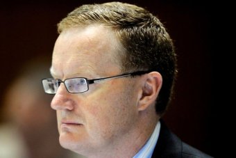 Dr Philip Lowe listens during a House of Representatives economics committee hearing in Canberra in 2010.