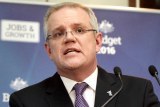 Scott Morrison speaks at a podium in the budget lock up.