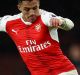 LONDON, ENGLAND - JANUARY 01: Alexis Sanchez of Arsenal runs with the ball during the Premier League match between ...