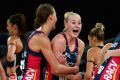 Perfect start: The Vixens celebrate their win over the Magpies on Saturday.