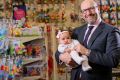 Baby Bunting CEO Matt Spencer and baby Anika age 16 week
