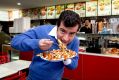 Senator Sam Dastyari tucks into a halal snack pack.