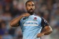 Reece Robinson calls instructions to a Waratahs teammate against the Western Force on Saturday.