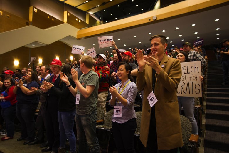 The crowd responds as Milo Yiannopoulos speaks at the University of Washington’s Kane Hall on Friday. (Dean Rutz/The Seattle Times)