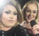 Adele impersonator feminem on stage with the real Adele at Domain Stadium.