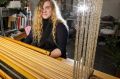 Toast founder Daisy Watt at her loom.