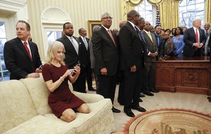 President Donald Trump, right, meets with leaders of Historically Black Colleges and Universities (HBCU) in the Oval Office of the White House in Washington, Monday, Feb. 27, 2017. Also at the meeting are White House Chief of Staff Reince Priebus, left, and Counselor to the President Kellyanne Conway, on the couch