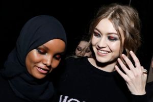 Models Halima Aden and Gigi Hadid are seen backstage ahead of the Alberta Ferretti show.