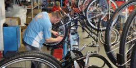 A sacked worker assembles "strike bikes"