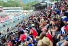 Hear the roar of supercars from the grandstand.