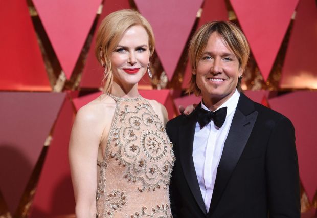 Nicole Kidman, left, and Keith Urban arrive at the Oscars on Sunday, Feb. 26, 2017, at the Dolby Theatre in Los Angeles. (Photo by Richard Shotwell/Invision/AP)