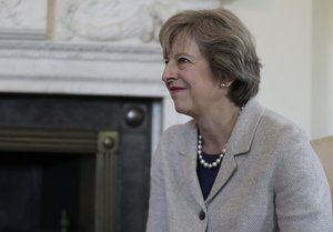 Britain's Prime Minister Theresa May listens to President of the European Council, Donald Tusk at10 Downing Street in London, Thursday, Sept. 8, 2016.