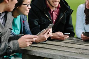 Young people with smartphones and tablets (Supplied: Young and Well Cooperative Research Centre)